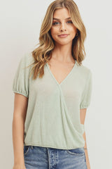 Textured knit surplice bottom string short sleeve top