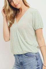 Textured knit surplice bottom string short sleeve top